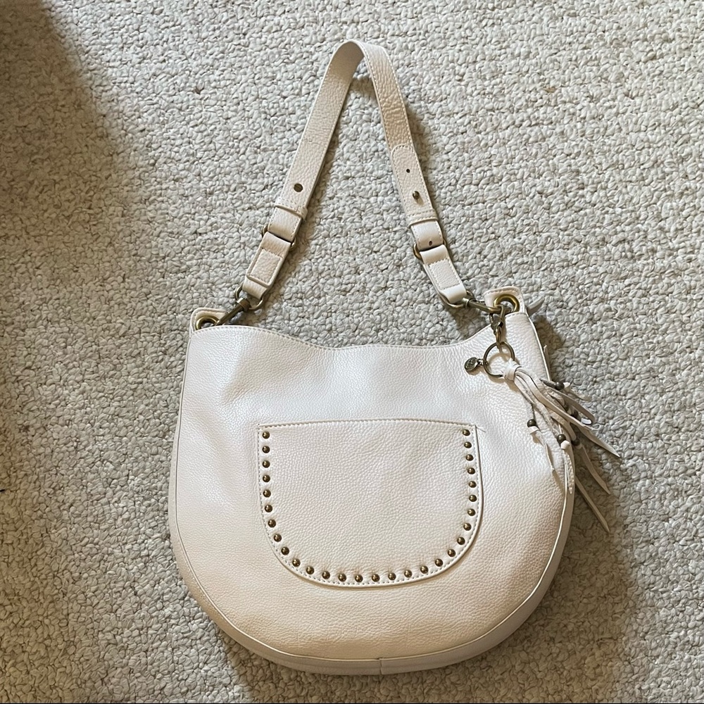 The Sak -- Leather antique white colored hobo bag w/brass tone hardware